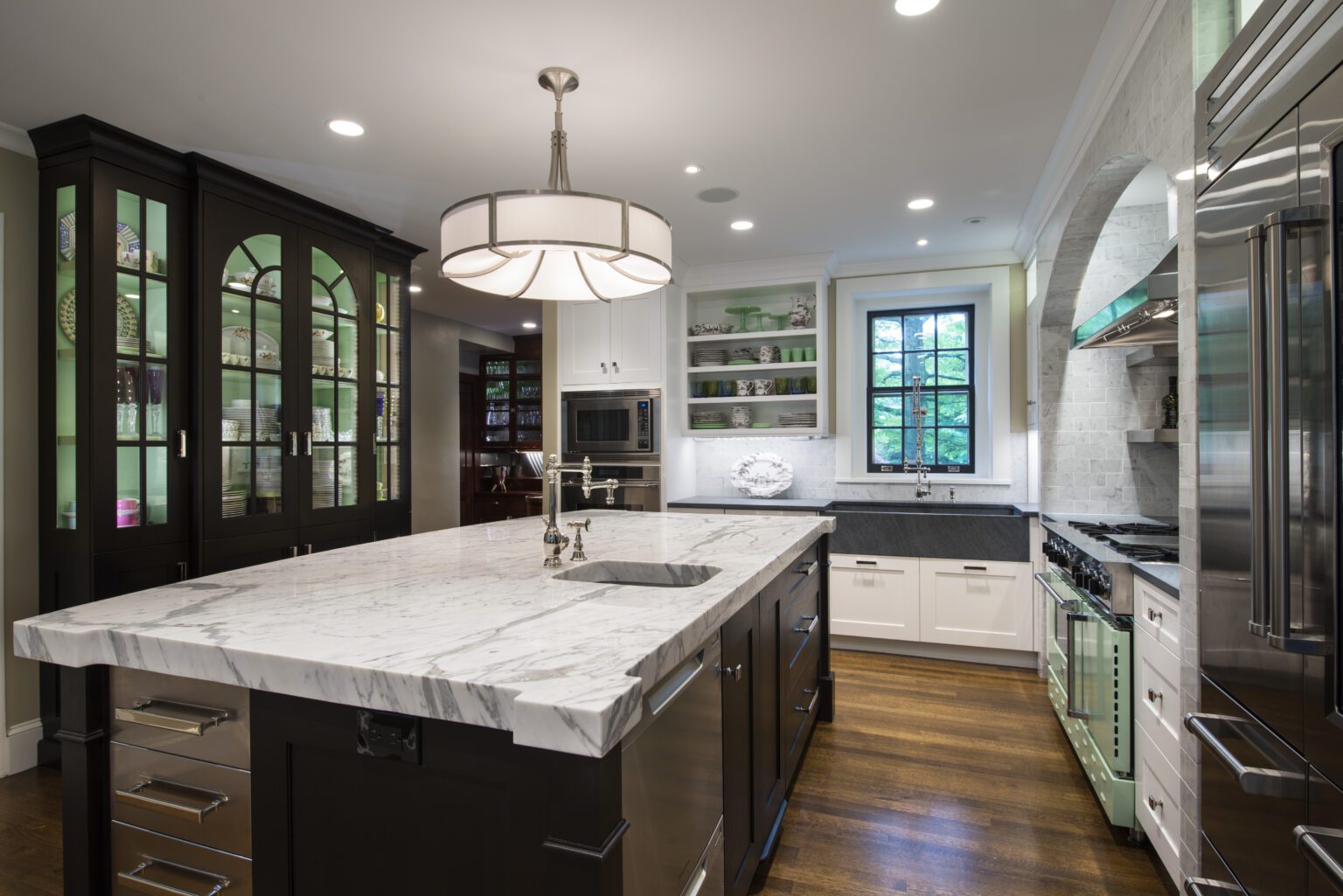 Le Kitchen Blending Dark Kitchen Cabinets with Wood Floors - Tobias Design LLC